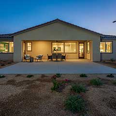 Residence 2 rear elevation at dusk.